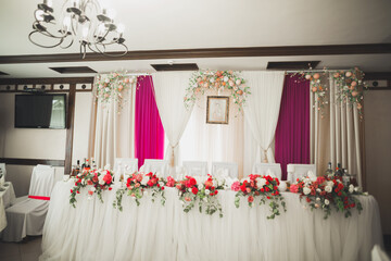 Interior of a restaurant prepared for wedding ceremony