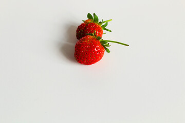 selective focus. two organic strawberries reserved for seed	
