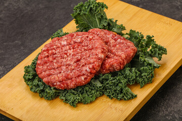 Raw beef burger cutlet for cooking