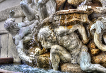 Fototapeta na wymiar Power By Land fountain at the Hofburg Palace, Vienna, Austria.