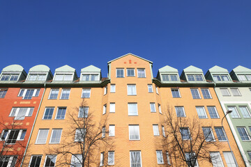 Low angle view of a 1990s era residential apartment building.