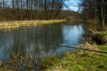 Obraz premium Fishing on the small river Grabia in the center of Poland. 