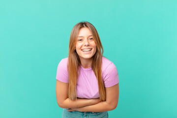 young pretty woman laughing out loud at some hilarious joke
