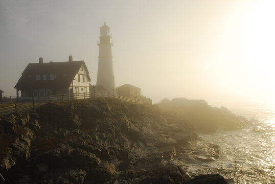 Portland Headlight in morning fog at dawn, Cape Elizabeth, Maine