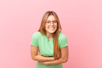 young pretty woman laughing out loud at some hilarious joke