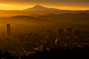 Sunrise on a misty March morning over Portland, with snow-capped Mt. Hood in the distance.