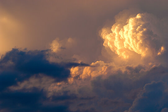 Sunset and storm clouds above Denver, Colorado during a summer thunderstorm.