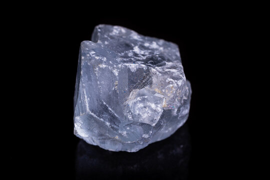 Macro mineral stone angelite on black background