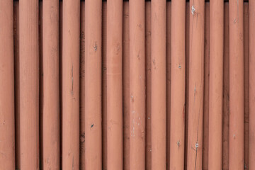 Old wooden fence. Reliable protection. Textured wooden fence. Made of boards