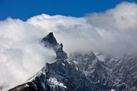 dramatic clouds and Tetons in grand teton national park