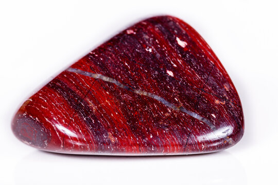 Macro mineral stone jasper "zebra iron" on a white background