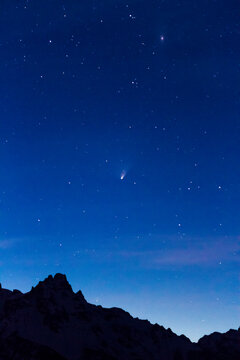 Teewinot lies below Comet Pan-STARRS and the Andromeda Galaxy in late March of 2013.