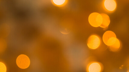 Blurred background with glowing lights. Festive mood