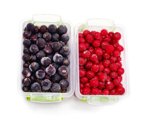 Frozen berries in containers.