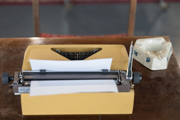 typewriter from a dozen years ago in yellow