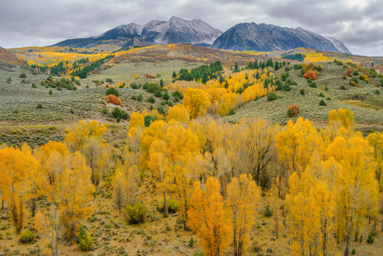 The first snow of the season in Colorado graces the peaks above McClure Pass.