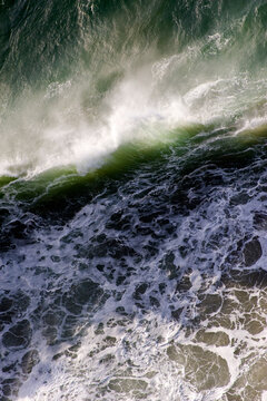Waves on a sunshiny day in winter seen from Neahkahnie Mountain on the Oregon coast.