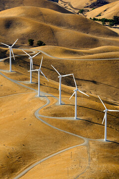 Lines of wind generators from an aerial perspective in the hills near San Francisco California.
