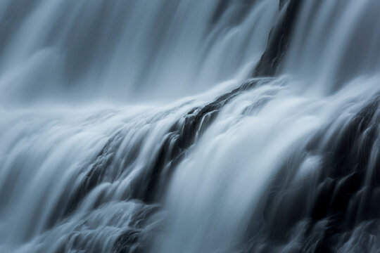 Detailed abstract of waterfalls in Iceland. Blue tint version.