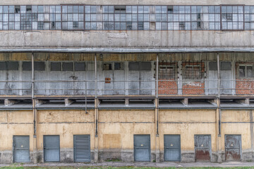 facade of an old concrete industrial building