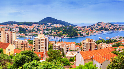 Fototapeta na wymiar Coastal summer landscape - top view of the port of Gruz of the town of Dubrovnik on the Adriatic coast of Croatia