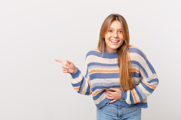 young pretty girl laughing out loud at some hilarious joke
