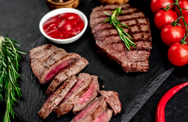 grilled beef steak on stone background