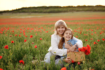 family in poppy field