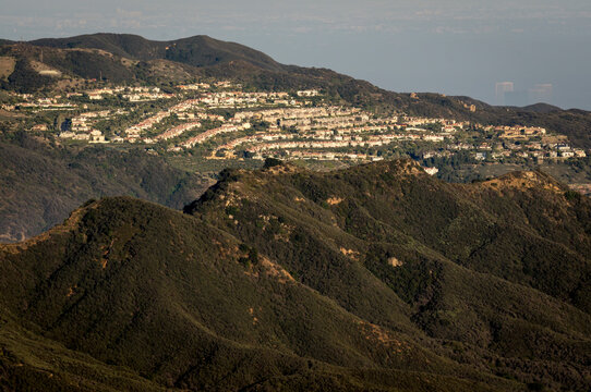 Wildland urban interface (WUI), houses breaking up Santa Monica Mountains National Recreation Area, Los Angeles, California