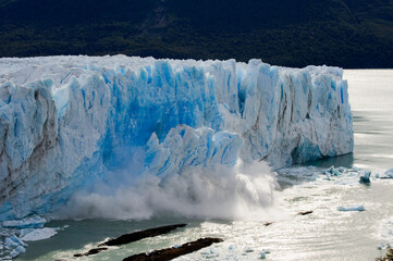 A roughly 50 meter square chunk of glacier calves off, Perito Moreno Glacier, Patagonia Argentina.