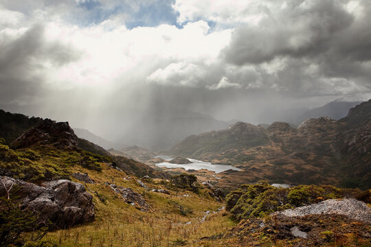 The sun breaks through on a rainy day in the Fjords of Chilean Southern Patagonia