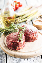 The raw beef meat steak on cutting board.