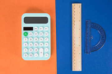 rulers and calculator on the table