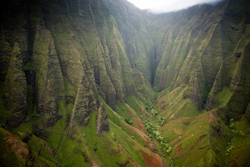 Aerial shots of the Napali Coast of the island of Kauai in Hawaii as seen from a helicopter