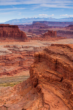 The rugged canyons of Canyonlands National Park extend in all directions as seen from The White Rim Trail near Moab, Utah.