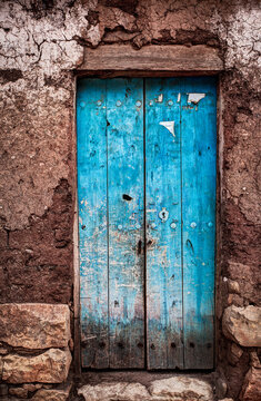 A rustic old door set in mud brick in Torotoro, Bolivia.