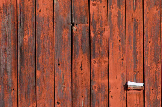 Close-up of a barn wall in a snow-covered field near Boulder, Colorado