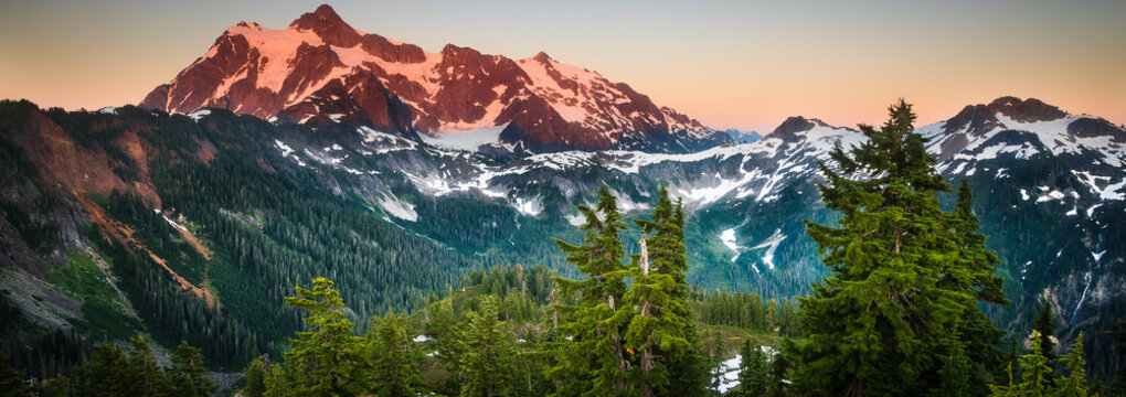 The summer sun sets over Mount Shuksan near Artist Point in the Cascades of Washington State.