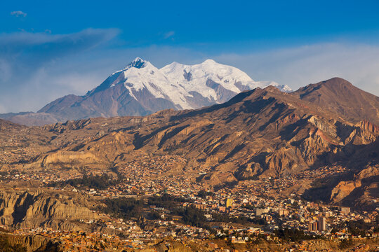 Mt. Illimani at sunset as seen from La Paz, Bolivia. The southernmost extension of the Cordillera Real is anchored by Mt. Illimani, the sentinel of La Paz.