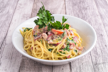 Pasta Carbonara on the wooden table