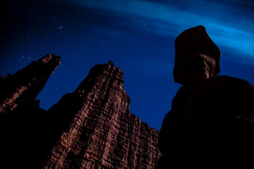 Fisher Towers silhouetted against the night sky - Moab, Utah