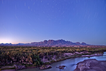 stars over the chisos mountains and rio grande river big bend national park, Texas