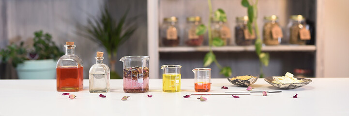 Banner with counter in a natural cosmetics workshop with essential oils and essences