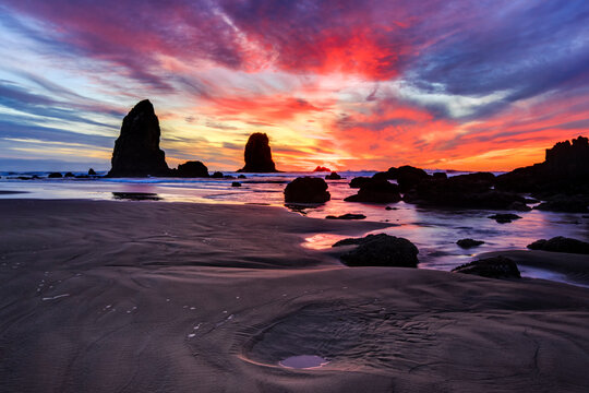 Cannon Beach, Oregon: A winter sunset at The Needles sea stacks.