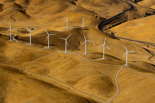 Lines of wind generators from an aerial perspective in the hills near San Francisco California.