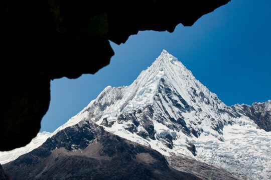 Piramide Peak (5885m/19,303ft) at the end of the Lago Paron Cirque in the Cordillera Blanca mountain range in Central Peru.