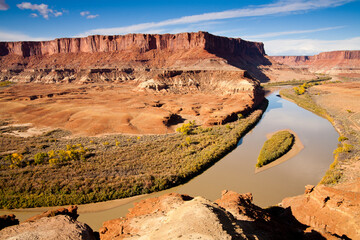 The rugged canyons of Canyonlands National Park extend in all directions as seen from The White Rim Trail above the Green River near Moab, Utah.