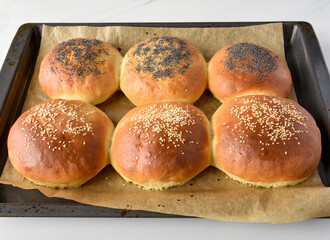 baked buns with sesame and poppy