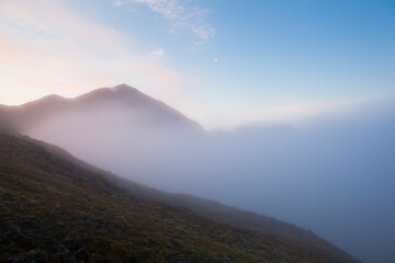 Low clouds obscure the summit of Fugleberget in Hornsund, Svalbard.