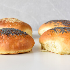 baked buns with sesame and poppy